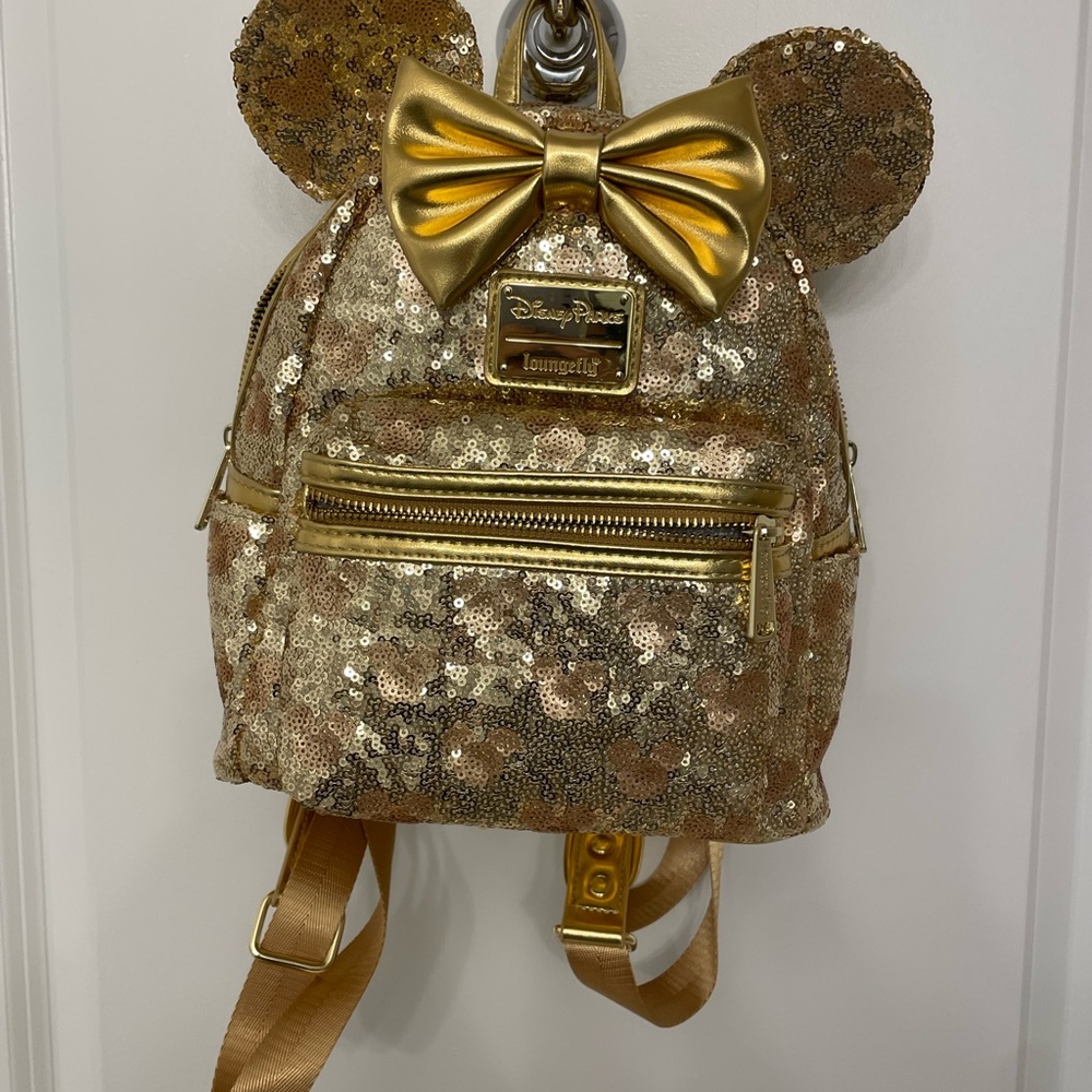 Disney hidden mickey Gold backpack lounge fly